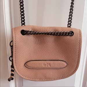 Coach tan/rose small purse with chain strap.